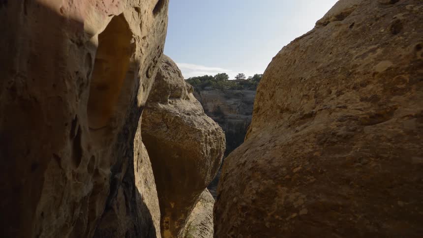 A scenery view through the giant boulder