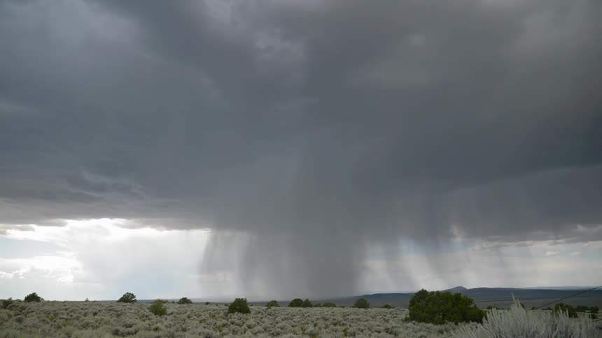 A storm rolls in the clouds