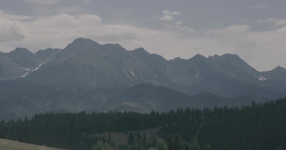 A time lapse view of a mountain scenery