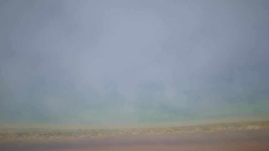 View of the landscape with fog blowing across