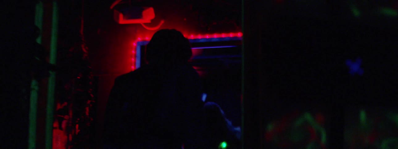 Man and woman playing laser tag
