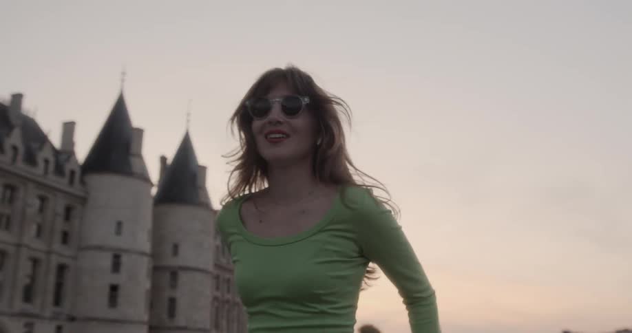 A woman is outdoors having fun