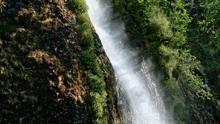 A slow motion of a waterfall flowing