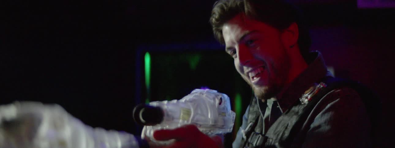 Man playing with laser gun