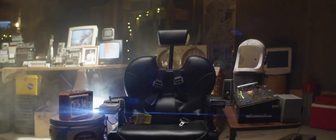 Chair surrounded by electronic equipment