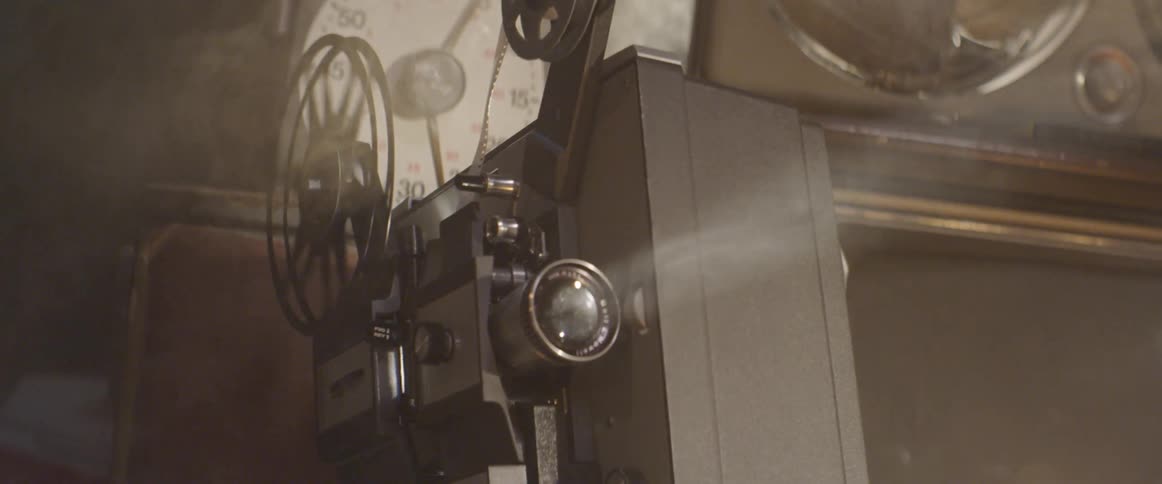 A film wheel spins rapidly on a projector
