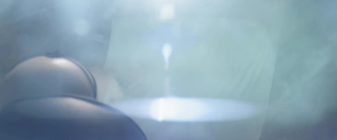 A flare and smoke in a room