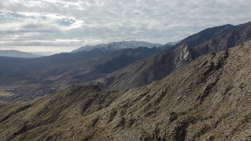 An aerial scenery of a rocky mountain