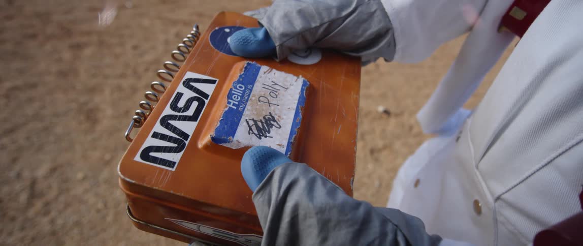 Someone wipe a box with nasa sticker on it