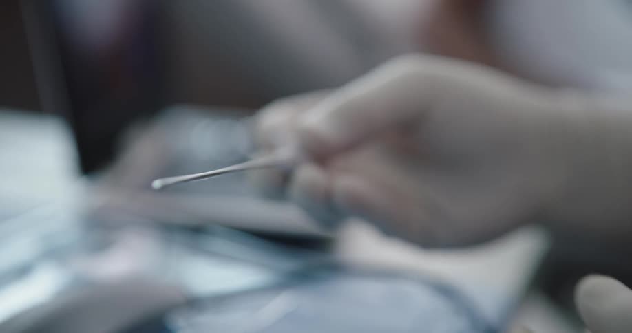 A person puts together a medical instrument