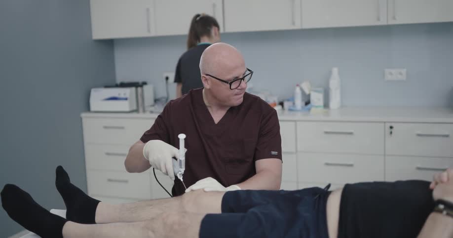 A nurse is assisting a doctor during a procedure