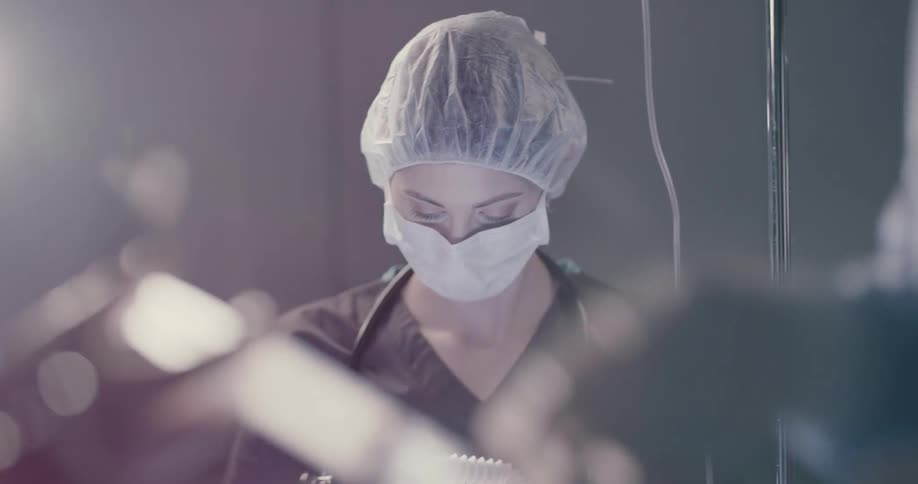 A bunch of doctor doing a surgeon on the surgery room