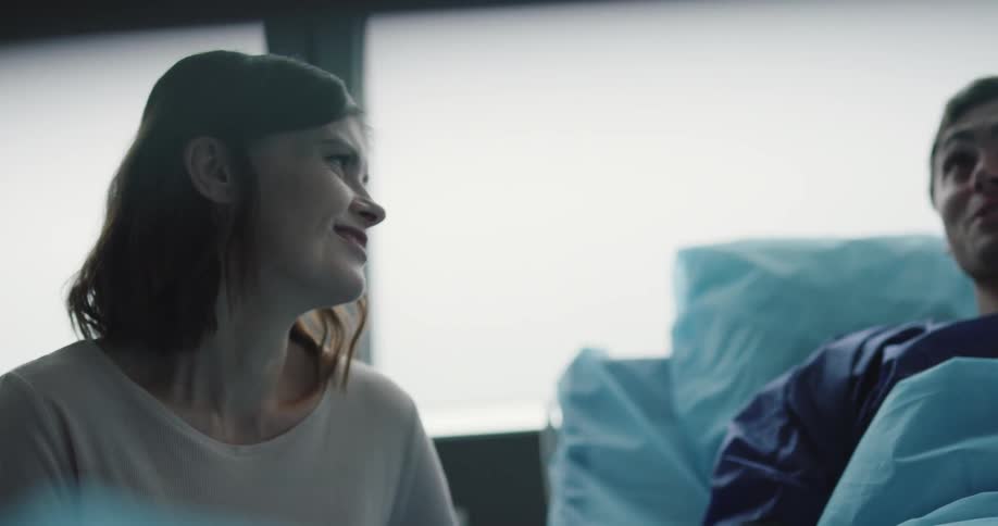 Couple cuddling on the hospital room