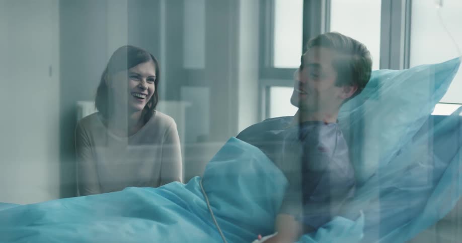 Couple chatting at the hospital room
