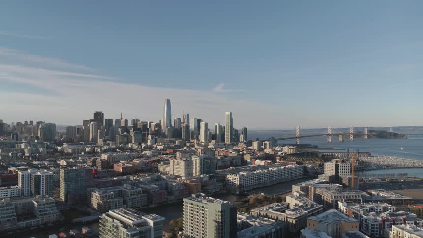 Skyline view of the city with the waterfront behind it
