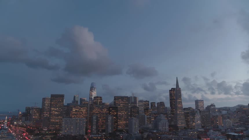 A scenery of a city skyline at night