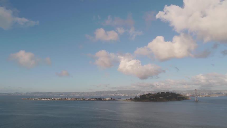 A scenery of an island in the middle of the ocean