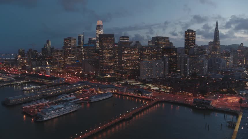 Skyline view of a harbor and the city at night