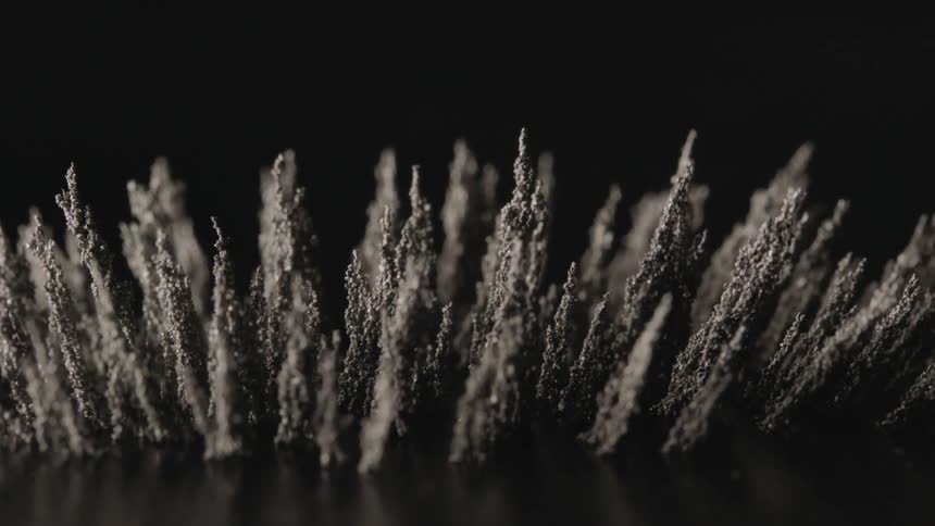 The dark material moves around in rows