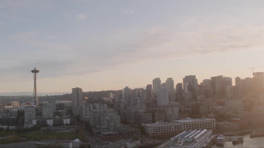 Clouds rise over a metro city