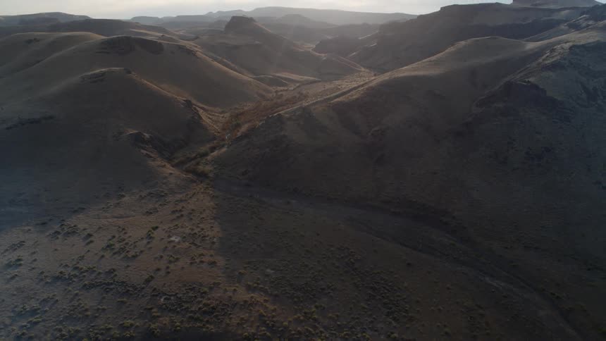 Landscape of barren mountains on a sunny day