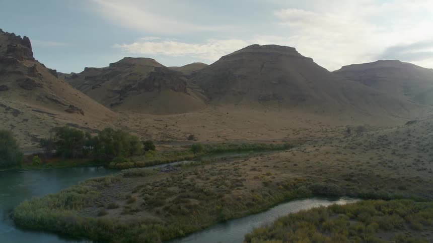 The water meets the hills ahead