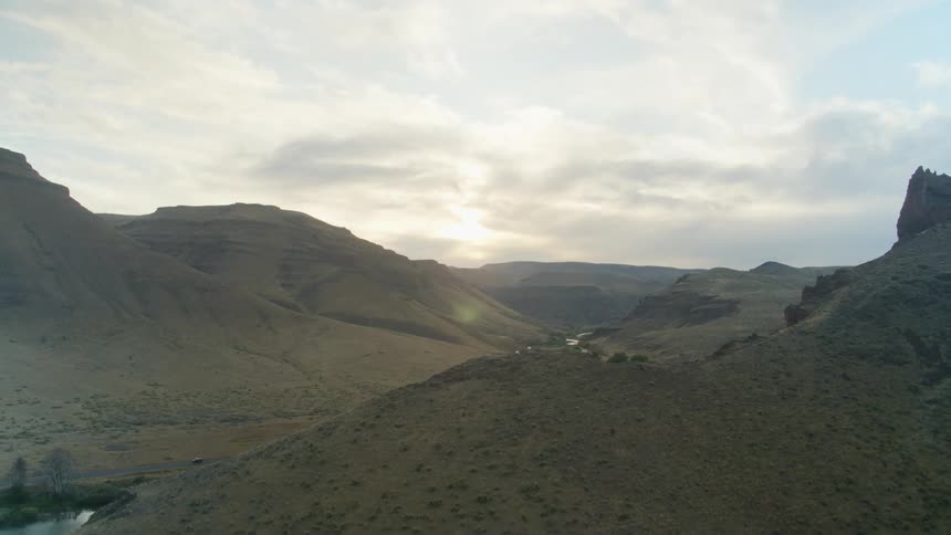 The sun is setting in the horizon