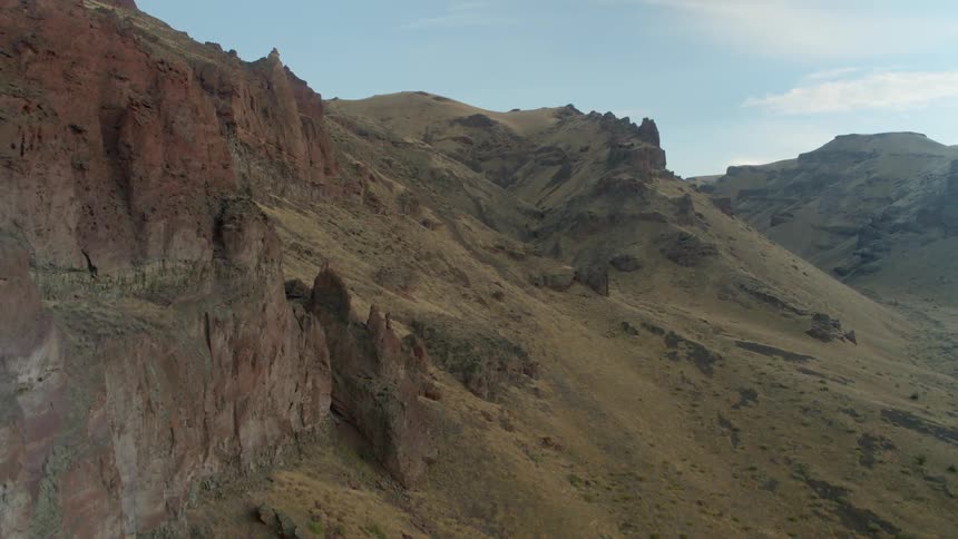 The mountains are full of green and jagged edges