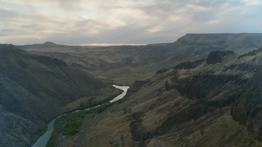 A scenery of a river between mountain