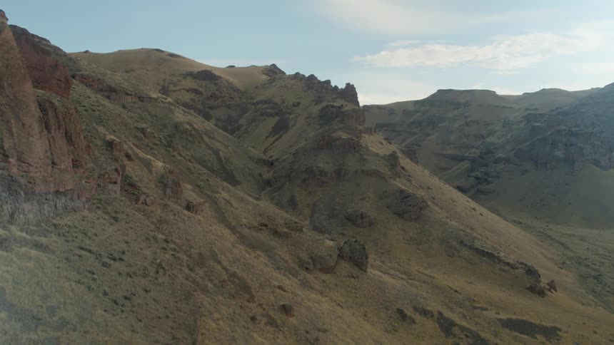 The mountains are green and vast