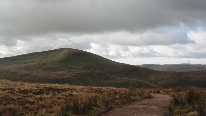 Landscape of barren hills on a cloudy day