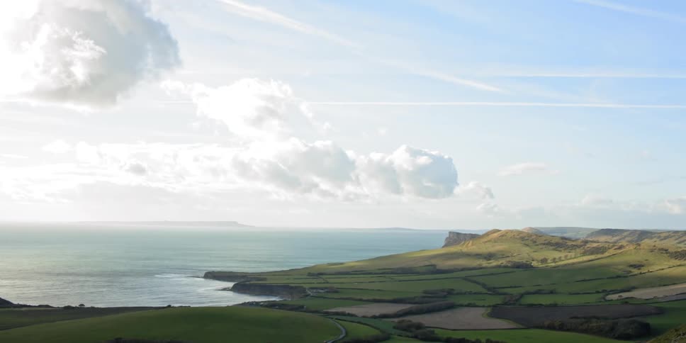 Landscape view of water and flat grasslands