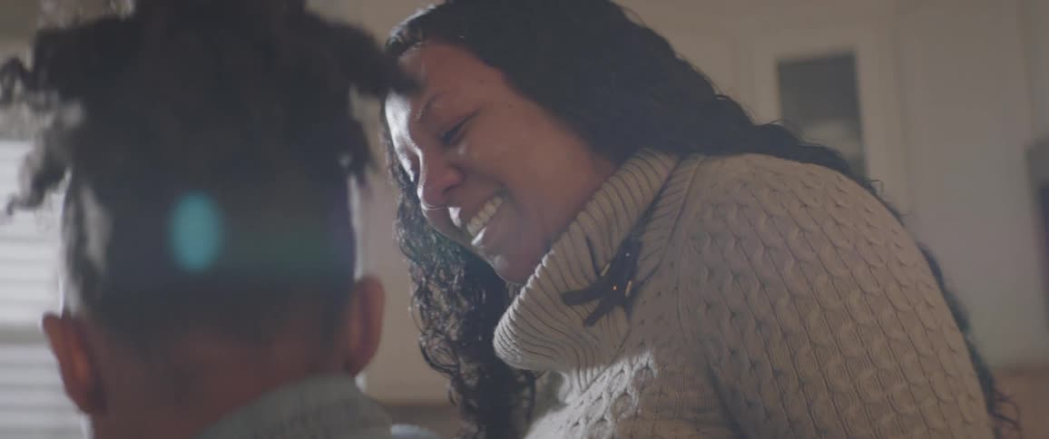 Mother smile happily to her daughter