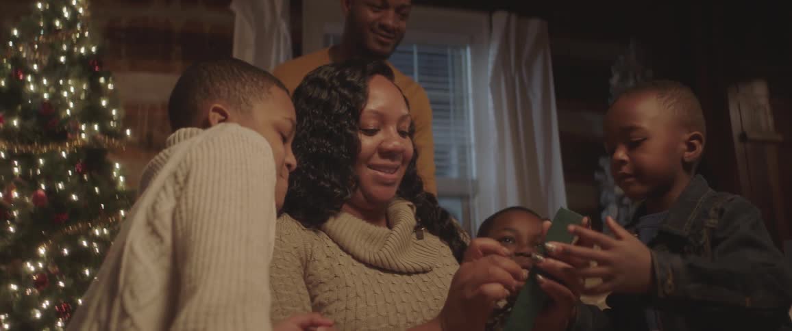Mother shares joy with her christmas gift