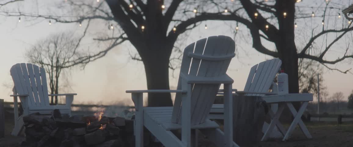 A view of a camp fire with no one