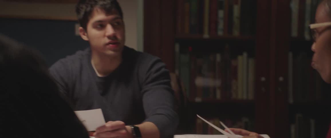 A group of people are studying together