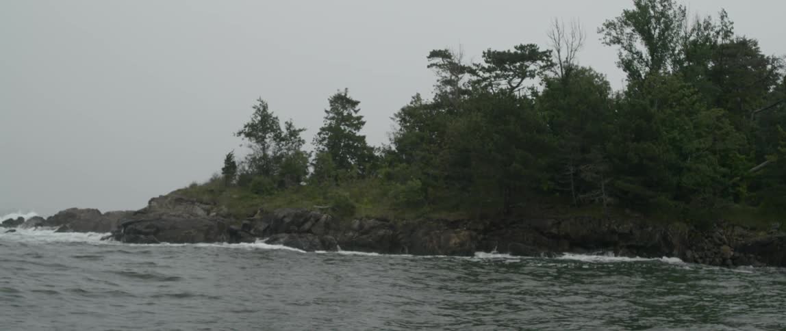 Rough seas crashing to a rocky coast