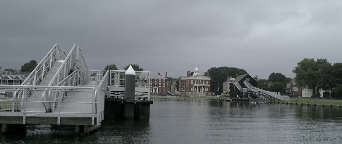 View of a dock and houses on the waterfront