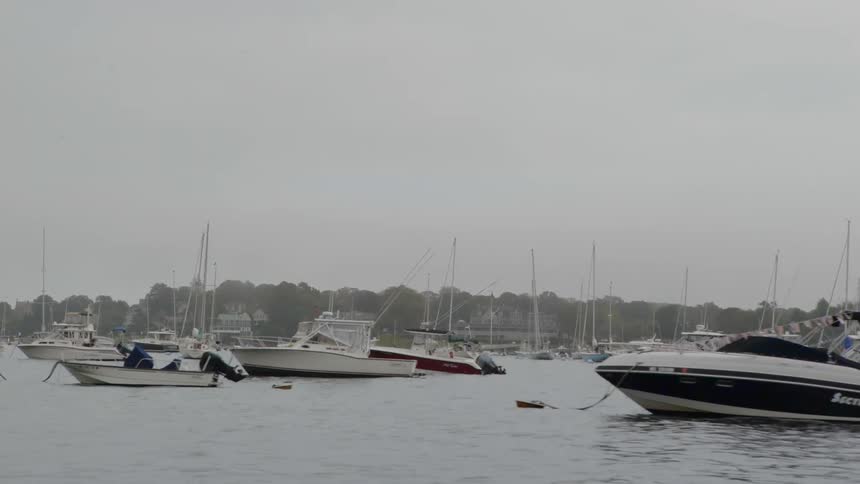 Boats are in the ocean water