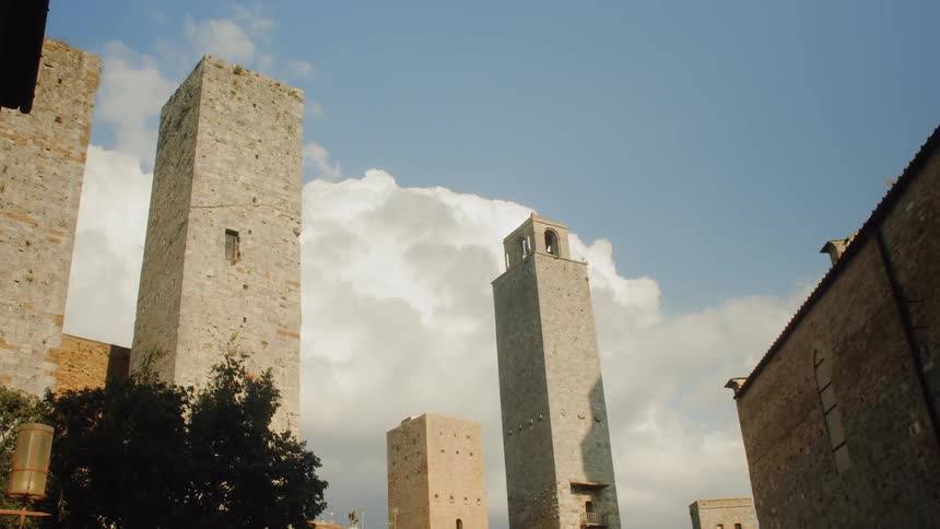 A rural village with tall towers and steeple