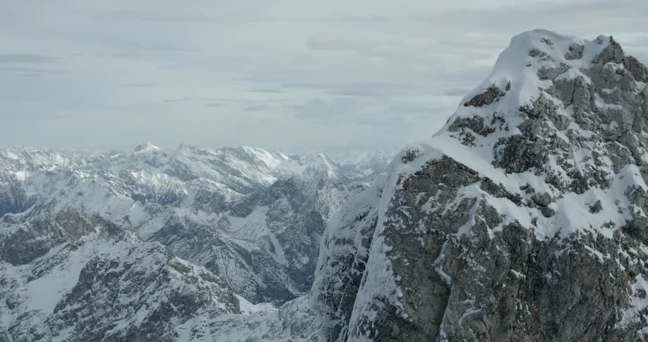 Snow capped mountains stretch across the horizon