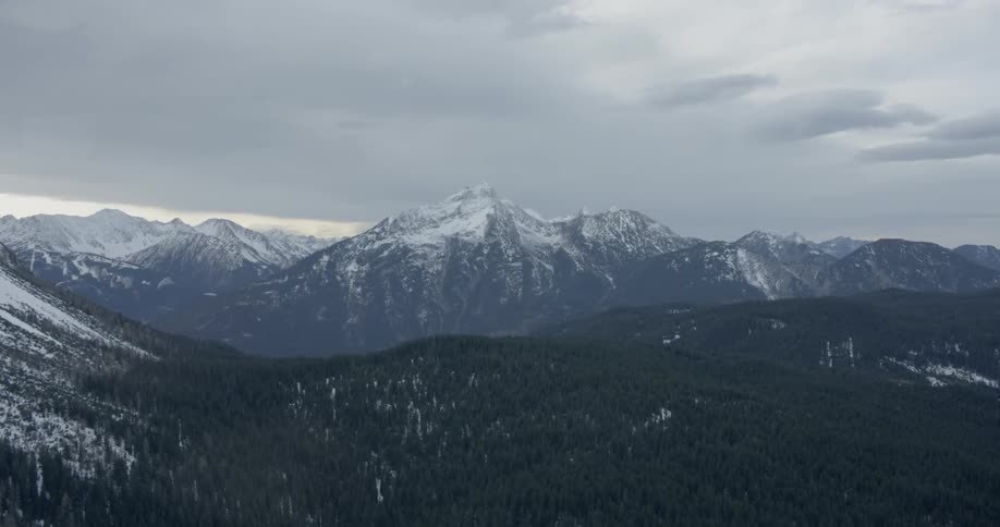 Landscape of snowy mountains on a cloudy day