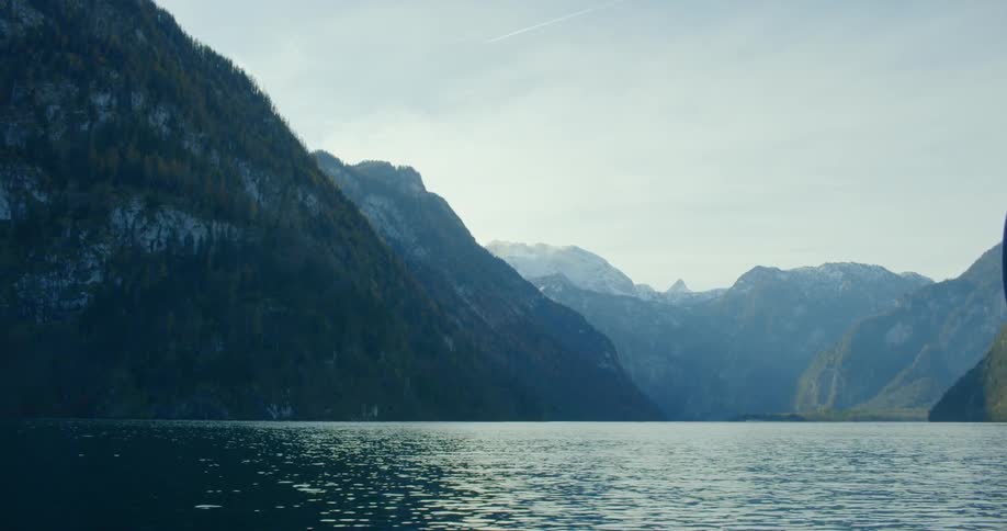 A scenery of a lake between mountain