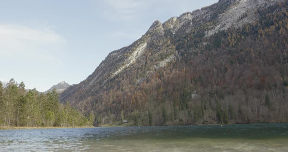 Water rushing with hills in the background