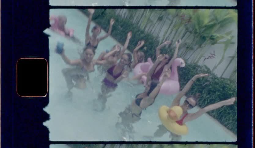 Film footage of teenagers playing in the water