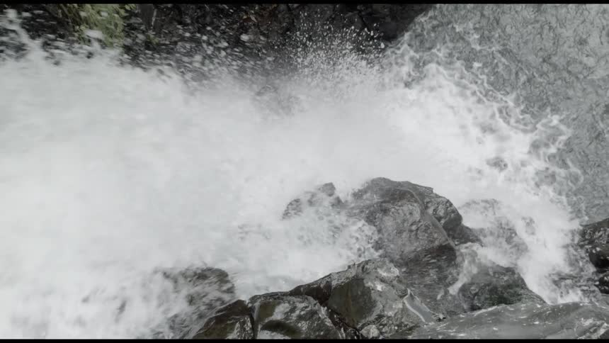 Waterfall rushing over rocks