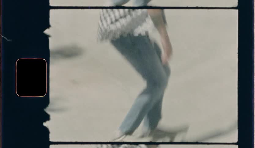 Man skateboards on an outdoor skateboard ramp