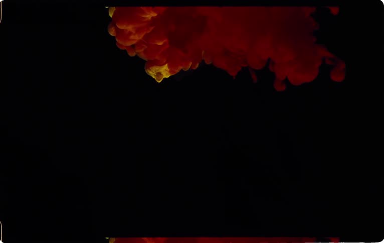 Bursts of color floating in liquid