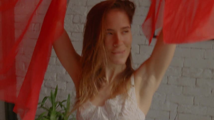 Sexy woman play with red scarf