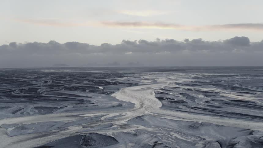 Heavy cloud front lays on horizon of ice sheet
